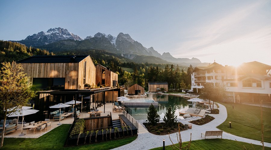 Forsthofgut Austria alpine spa lounge with hanging rope lounger and mountain view