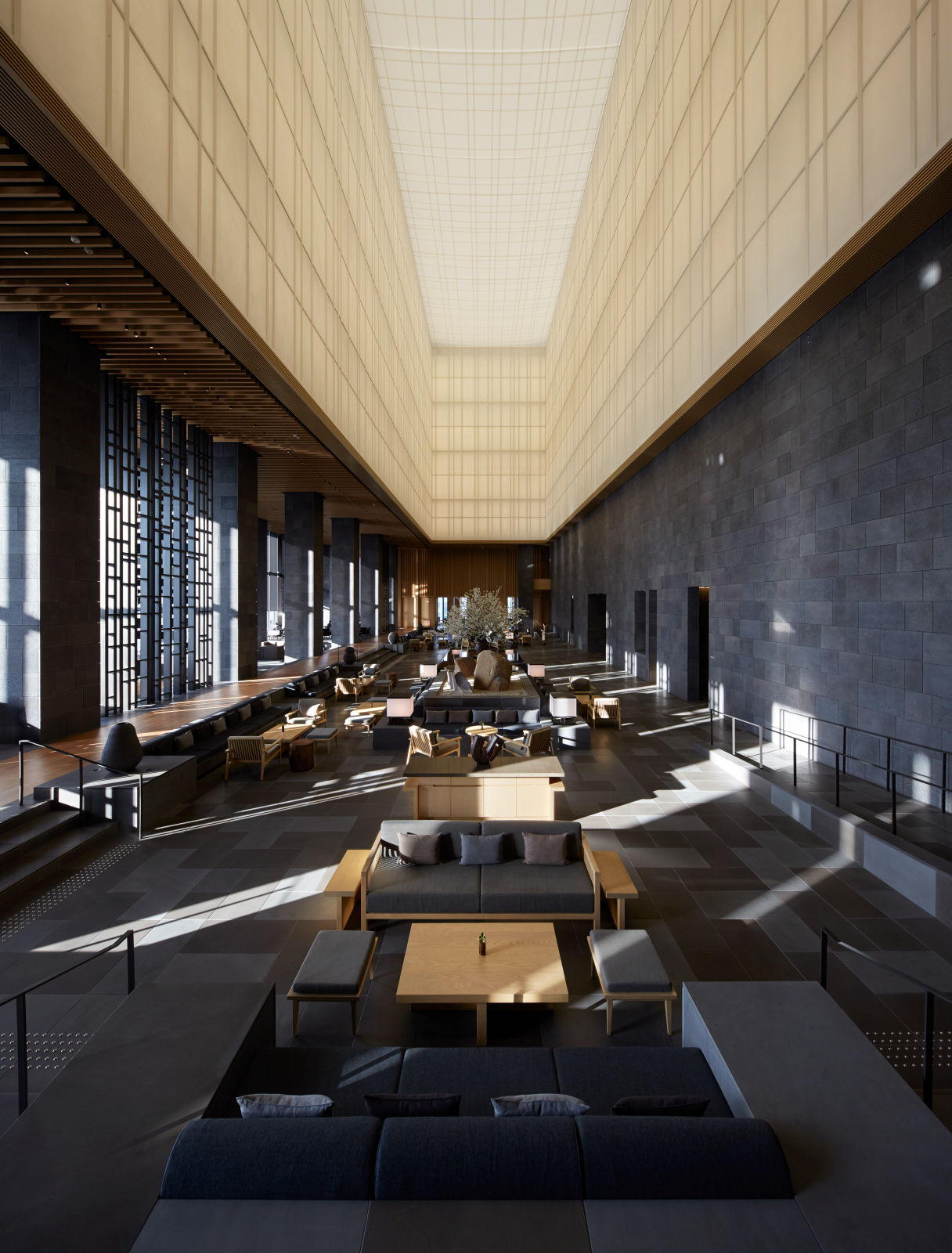 Aman Tokyo's six-storey atrium lobby with washi paper screens