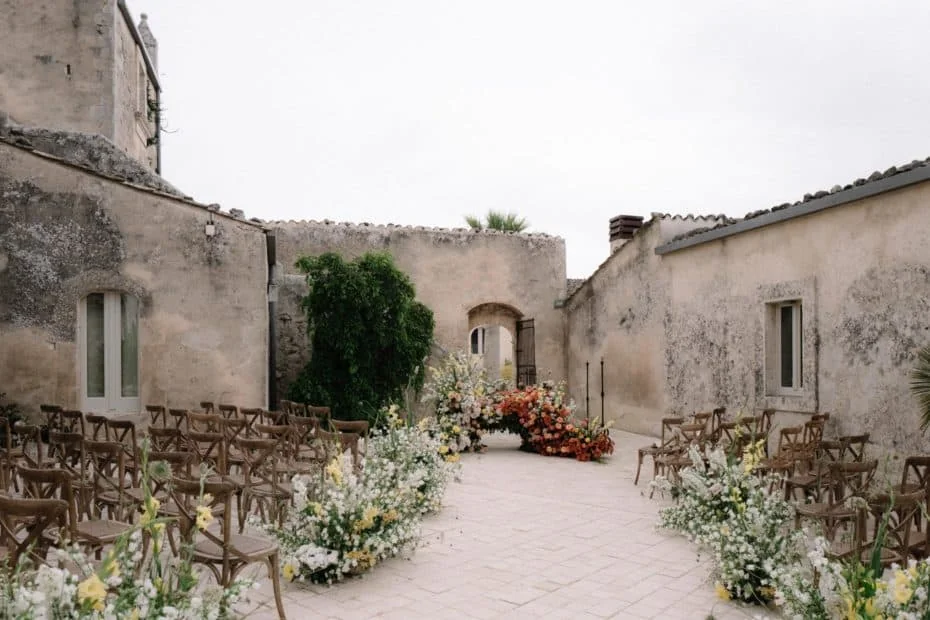 Stone courtyard at Dimora delle Balze, a restored 19th-century masseria near Noto in southeastern Sicily