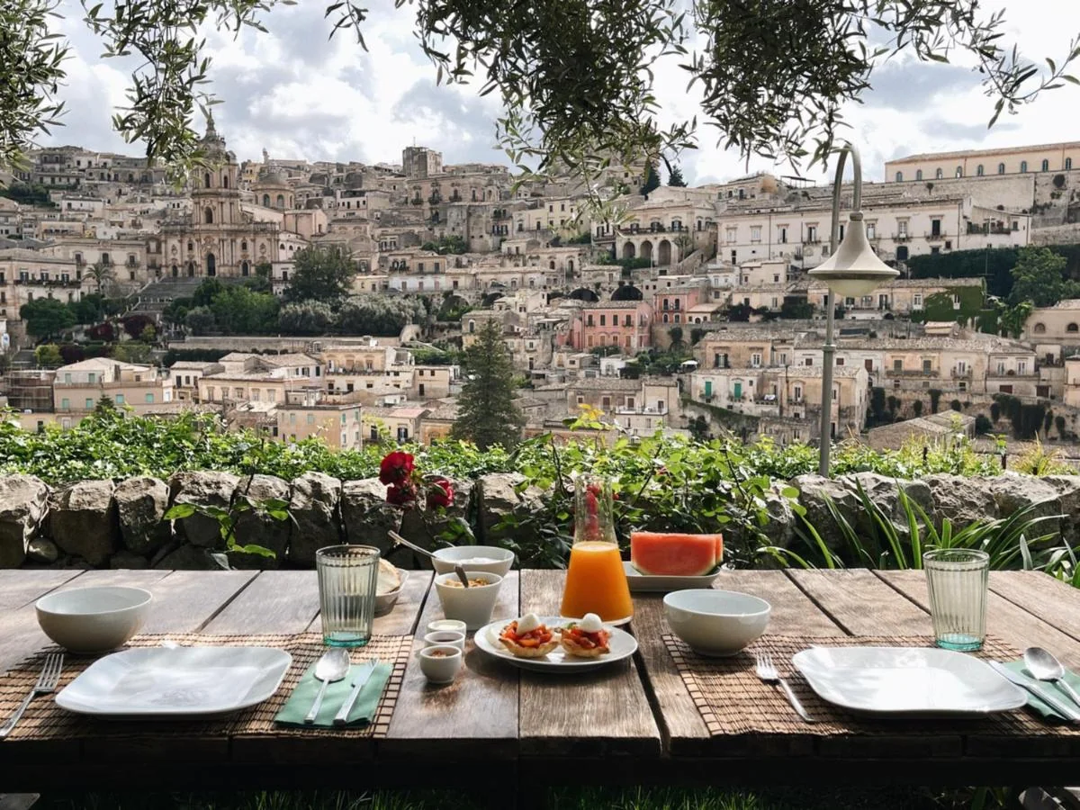 Casa Talia's terraces overlooking the honey-coloured baroque rooftops of Modica, southeastern Sicily