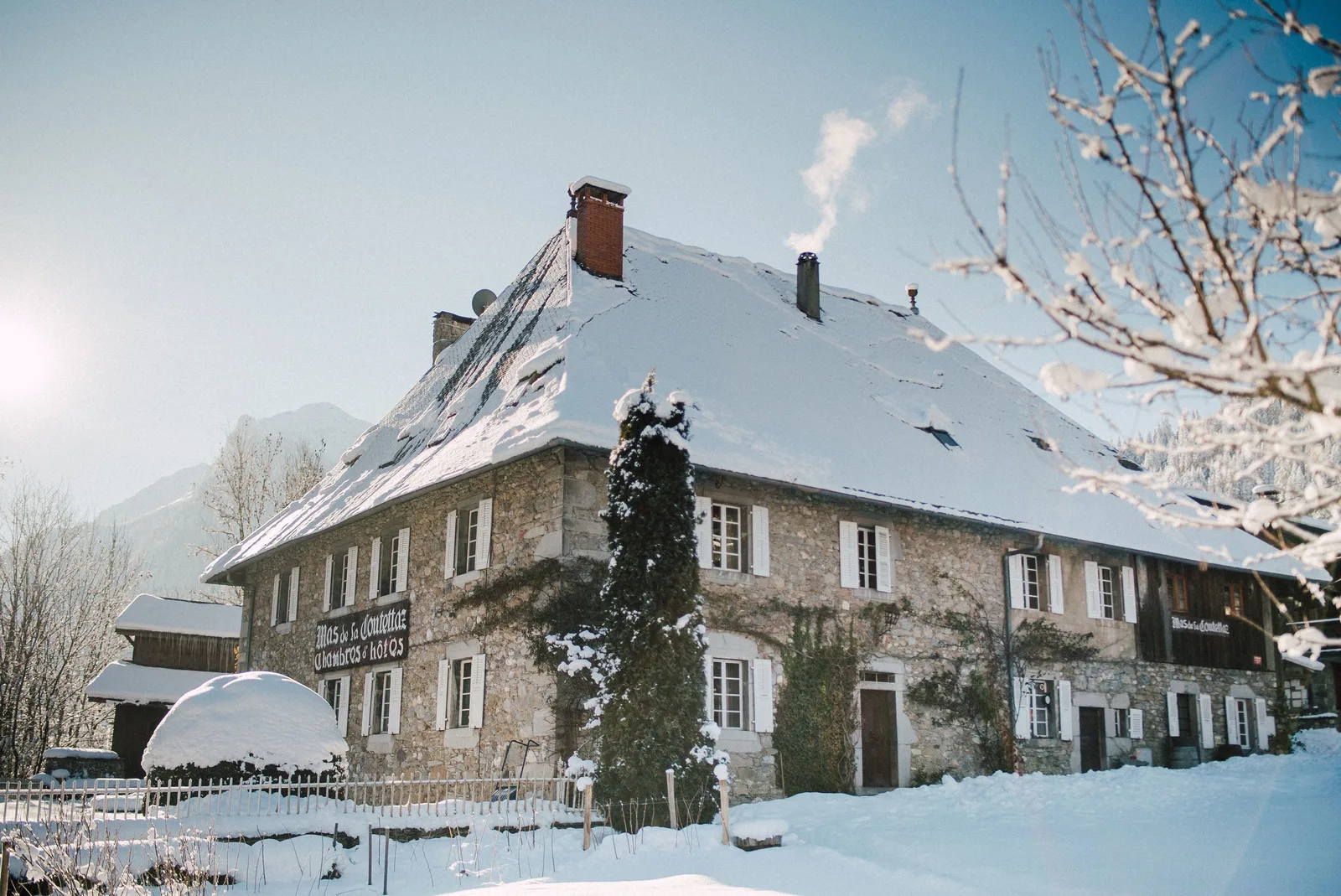 Chalet Mas de la Coutettaz stone farmhouse in snow near Morzine, French Alps