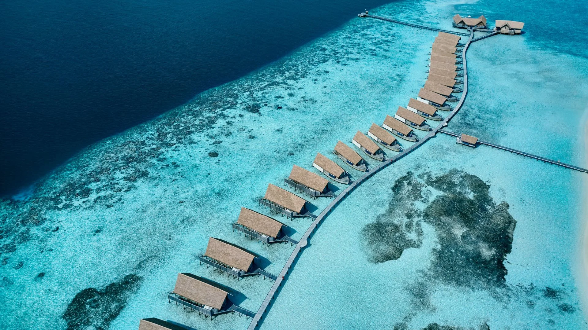 Dhoni-shaped overwater villas at COMO Cocoa Island, South Malé Atoll